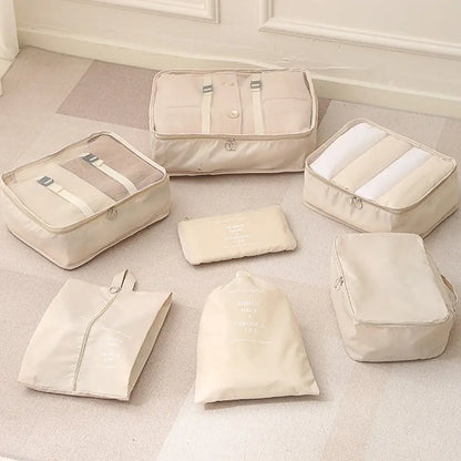 Beige packing cubes and bags in the Ultimate PCS Set Travel Organizer for easy travel storage