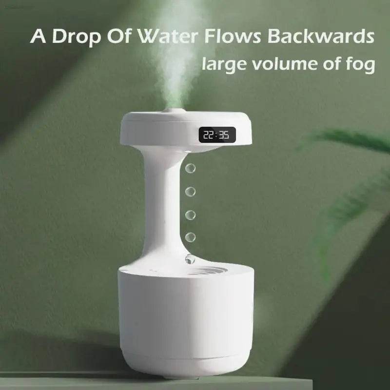 White humidifier with digital clock and simulated reverse water flow.