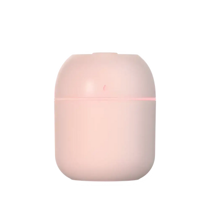 Pink cylindrical container of the Ultrasonic Trio portable USB ultrasonic humidifier