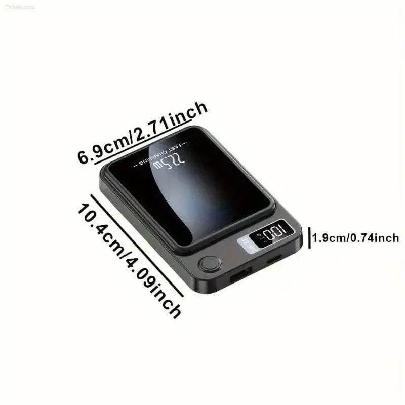 Black portable power bank with digital display.