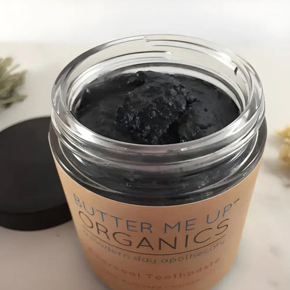 Jar of Unleash Hollywood Smile Organic Activated Charcoal Toothpaste with coconut oil