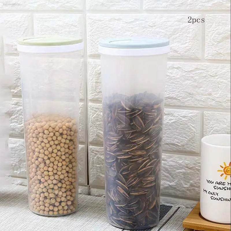 Two cylindrical food storage containers.