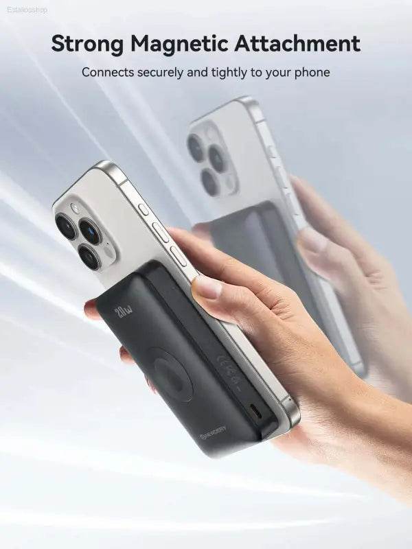 Magnetic wireless power bank attached to a phone.