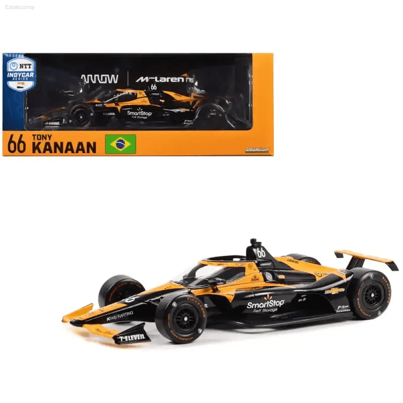 Unleash the Blazing Orange Indycar Racer Diecast Model! Here is a Product Description: Own a Piece of Racing History with this Stunning Mclaren - Estalios