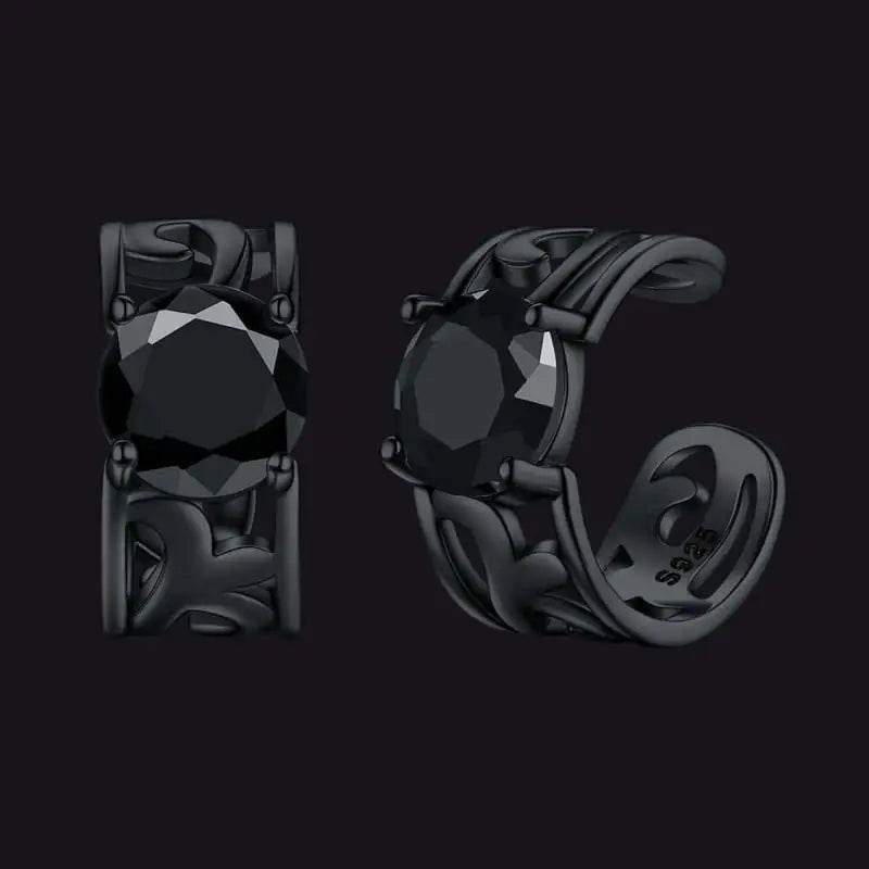 Pair of black gemstone ear cuffs.