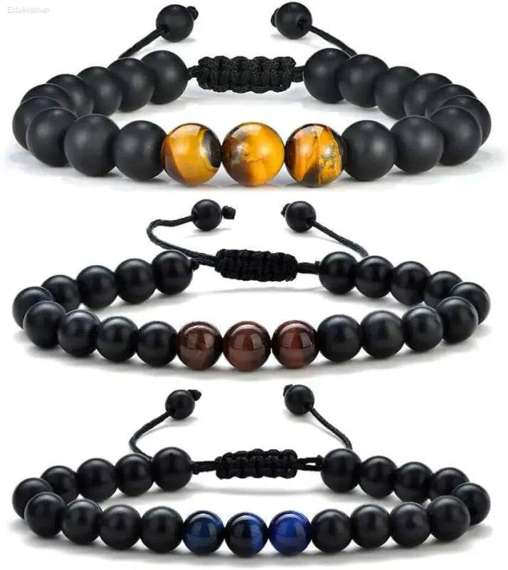Three beaded bracelets.