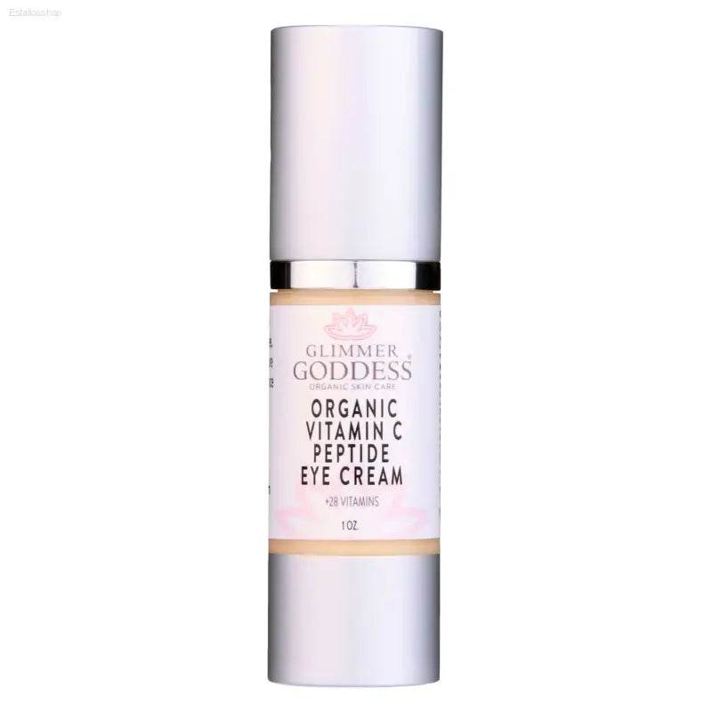 Silver and white eye cream container.