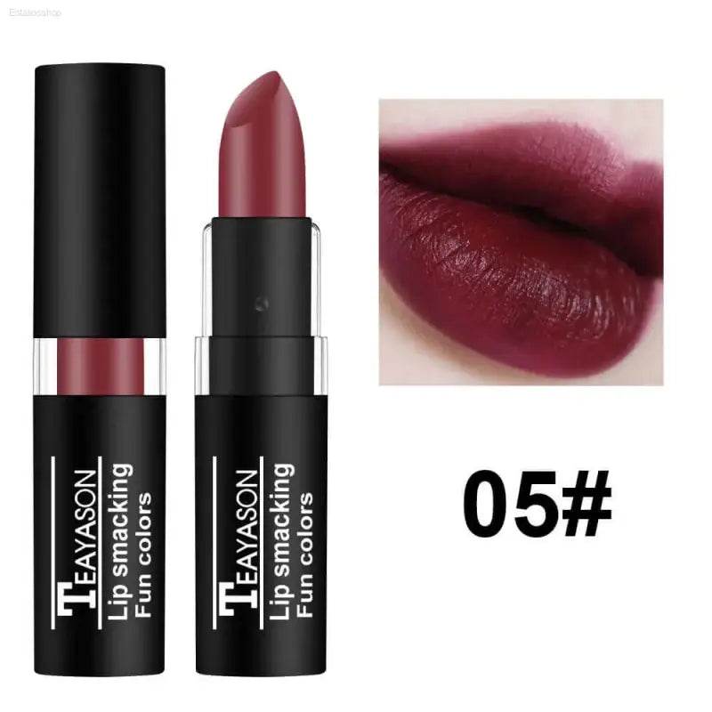 Burgundy lipstick with matching lip swatch.