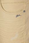 Yellow pants with a rabbit logo.