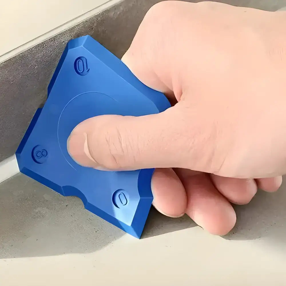 Blue triangular sealant tool from a versatile 4-piece silicone caulking set