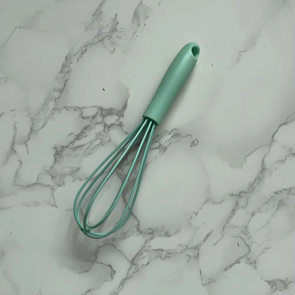 Mint-green silicone whisk from Vibrant Mini Silicone Whisks, a kitchen essential