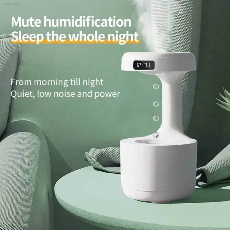 White humidifier with digital clock.