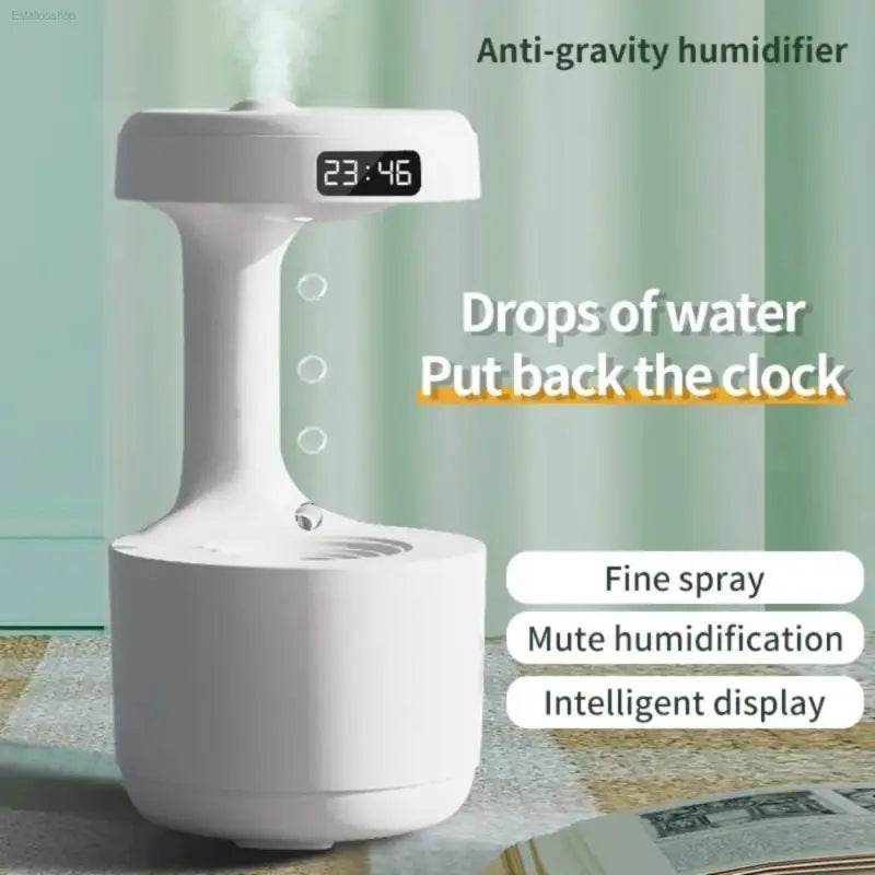 White anti-gravity humidifier with digital clock.