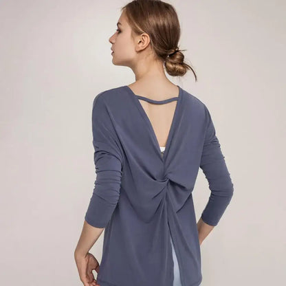 Blue long-sleeved twist-back top, perfect for fast dry running and loose yoga clothes