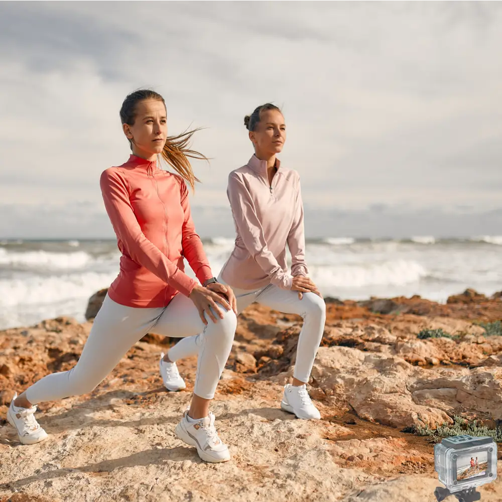 Two women stretching in stylish activewear perfect for action camera adventures