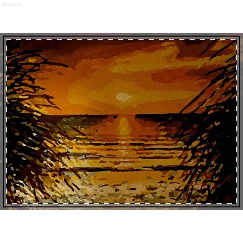 Sunset over water framed by foliage.