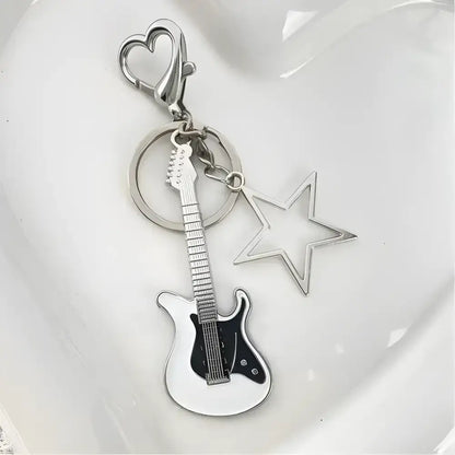 Zakol Y2K Guitar Love Keychain featuring a cool guitar and star charm