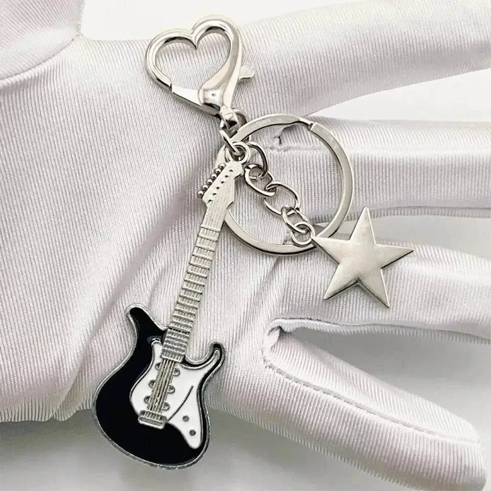 Zakol Y2K Guitar Love Keychains featuring a guitar and heart star keychain design