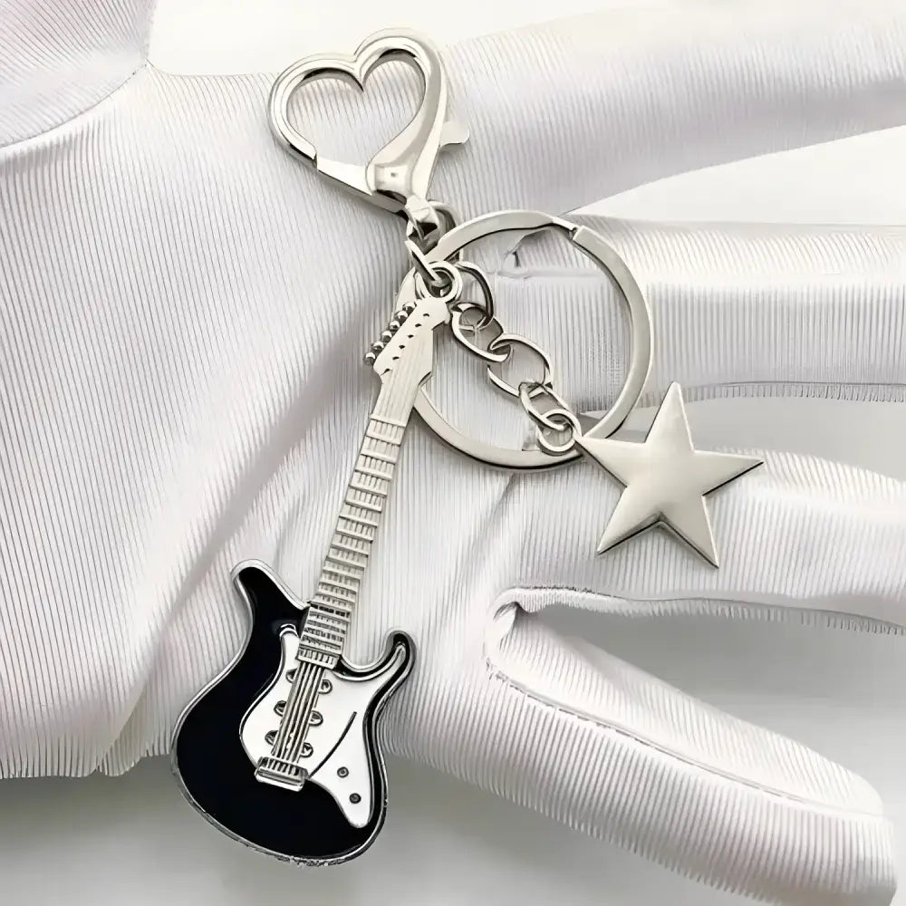 Guitar and star keychain from Zakol Y2K Guitar Love collection, perfect for guitar lovers