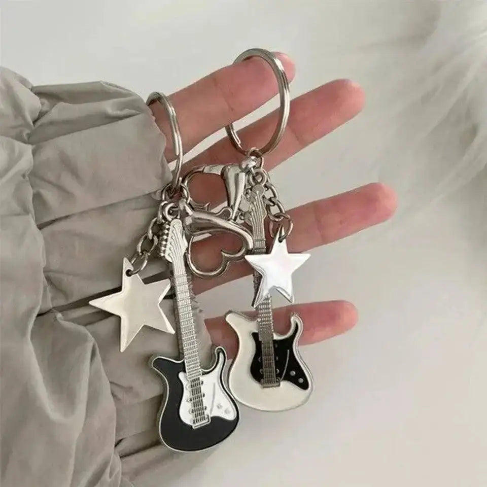 Guitar-themed keychains from Zakol Y2K Guitar Love add a fun touch to your style