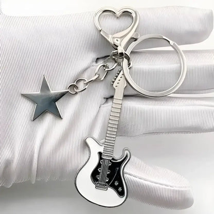 Zakol Y2K Guitar Love Keychain featuring a guitar and heart star keychain design